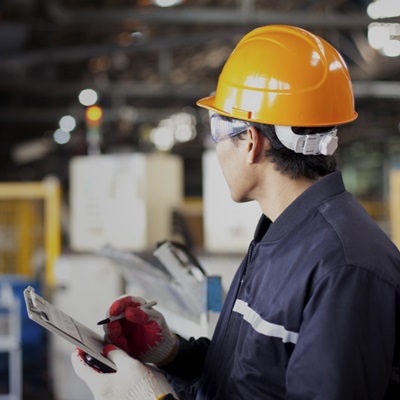 Safety professional conducting inspection